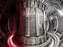 Photo of interior of JET with superimposed plasma