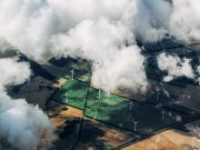 Wind farm seen from above the clouds